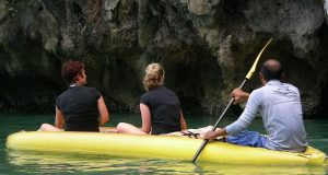 women sitting in a boat